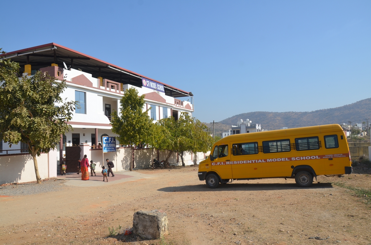 CFI Model School campus and school bus